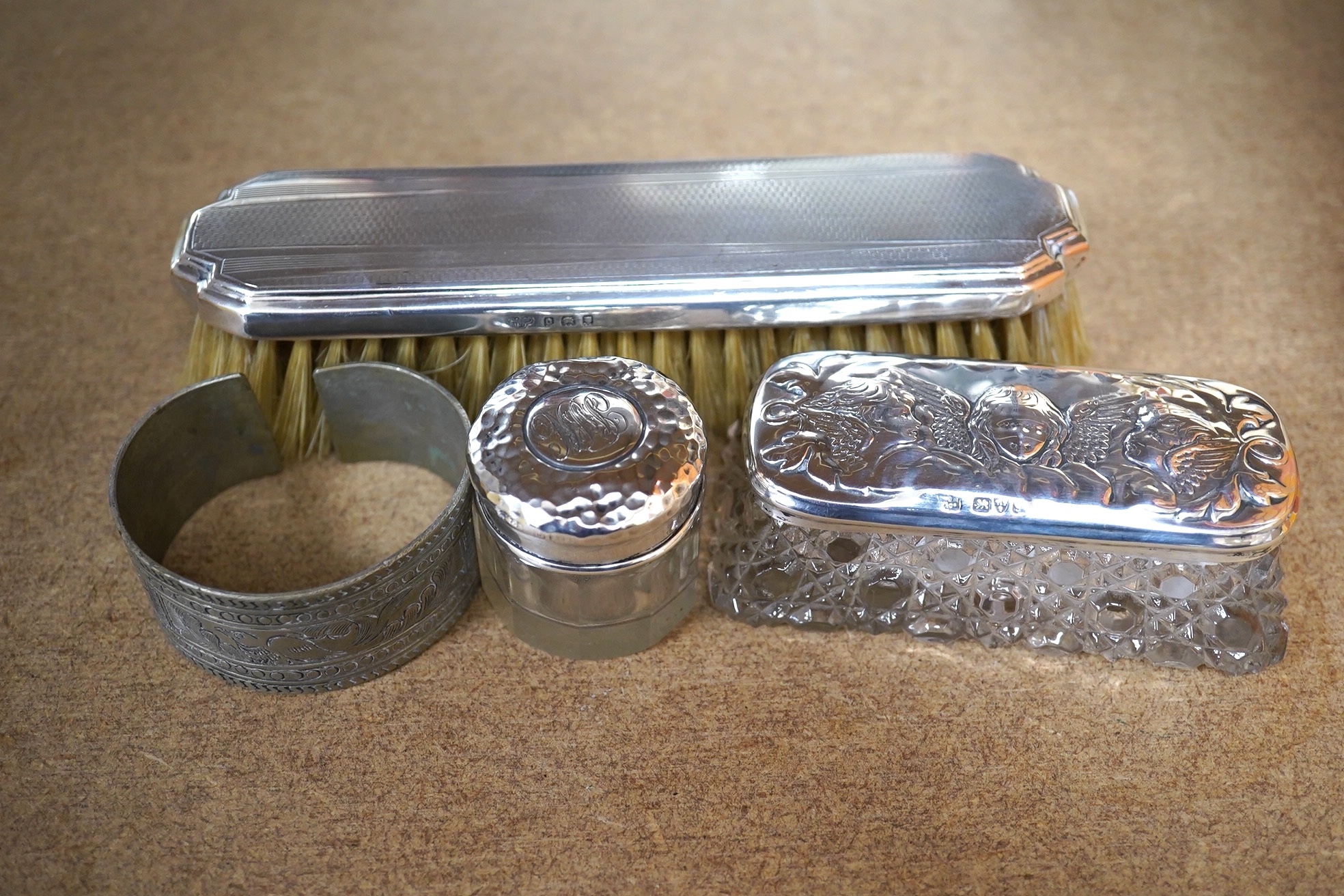 Sundry small silver including an Edwardian bowl and cream jug, a cased pair of Victorian napkin rings, a cased christening pair, a cigarette holder case, thimble and five dressing table items, together with seven plated